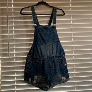 Blue denim overalls